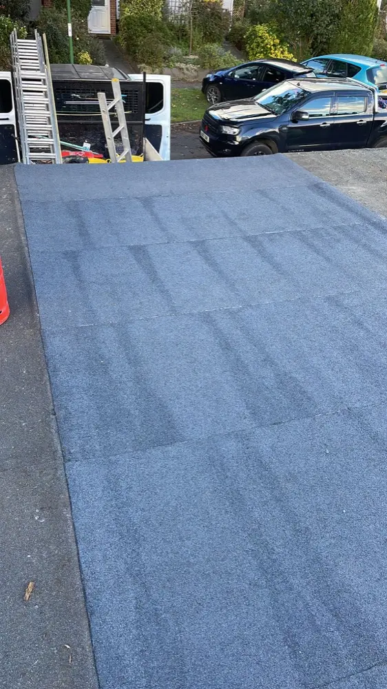 Completed mineral felt flat roof laid to fall, finished by GK Foster & Son Roofing